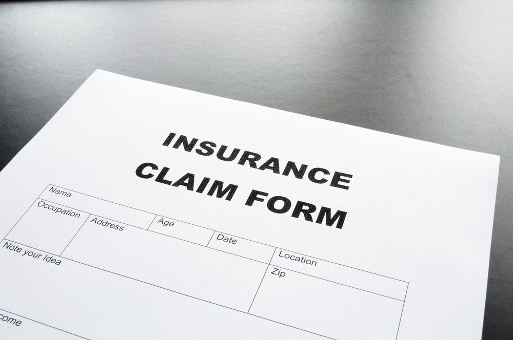 A close up of an insurance claim form